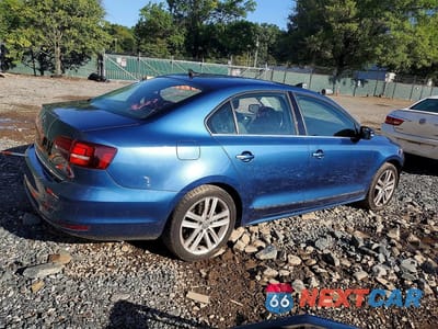 Trzecie zdjęcie samochodu z tyłu: 2017 VOLKSWAGEN JETTA SEL VIN:3VWL17AJ3HM395923 - miniatura