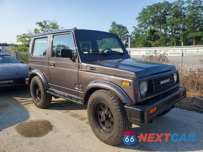 Czwarte zdjęcie samochodu z boku: 1986 SUZUKI SAMURAI VIN:JS3JC51V8G4110639 - miniatura