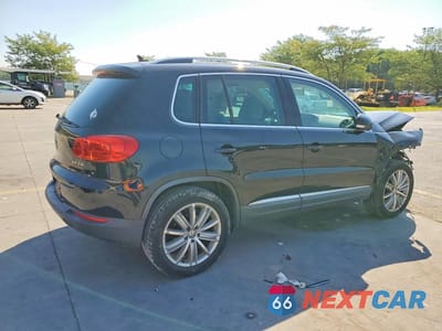 Trzecie zdjęcie samochodu z tyłu: 2012 VOLKSWAGEN TIGUAN S VIN:WVGAV7AX2CW530039 - miniatura