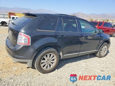 Trzecie zdjęcie samochodu z tyłu: 2010 FORD EDGE SEL VIN:2FMDK3JC4ABA12413 - miniatura