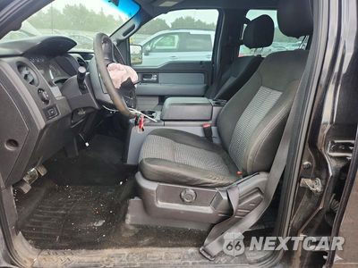 Zdjęcie 7 z 12 samochodu: 2014 FORD F150 SUPERCREW VIN:1FTFW1EF1EKF70693 - miniatura