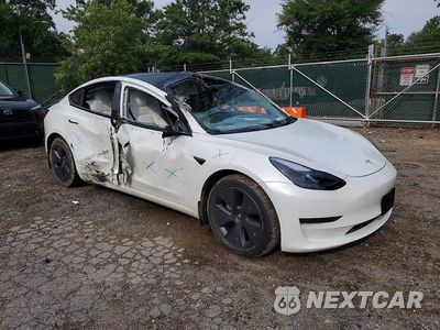 Czwarte zdjęcie samochodu z boku: 2022 TESLA MODEL 3 VIN:5YJ3E1EA8NF255039 - miniatura