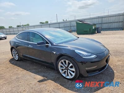 Czwarte zdjęcie samochodu z boku: 2020 TESLA MODEL 3 VIN:5YJ3E1EB6LF668597 - miniatura