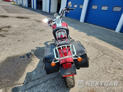 Czwarte zdjęcie samochodu z boku: 2004 HARLEY-DAVIDSON FXSTI VIN:1HD1BVB124Y026137 - miniatura