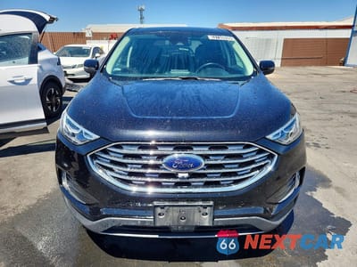 Piąte zdjęcie samochodu w środku: 2022 FORD EDGE TITANIUM VIN:2FMPK4K98NBB04961 - miniatura