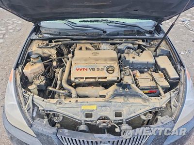 Zdjęcie 11 z 12 samochodu: 2004 TOYOTA CAMRY SOLARA SE SPORT V6 VIN:4T1CA38P14U008499 - miniatura