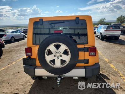 Zdjęcie 6 z 13 samochodu: 2012 JEEP WRANGLER UNLIMITED SAHARA VIN:1C4HJWEG0CL248017 - miniatura