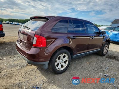 Trzecie zdjęcie samochodu z tyłu: 2012 FORD EDGE SE VIN:2FMDK4GC3CBA83487 - miniatura