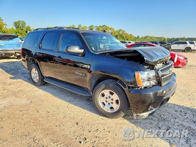 Czwarte zdjęcie samochodu z boku: 2009 CHEV TAHOE 1500 VIN:1GNFC23009R153826 - miniatura