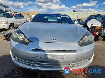 Piąte zdjęcie samochodu w środku: 2007 HYUNDAI TIBURON GT VIN:KMHHN66F27U235131 - miniatura