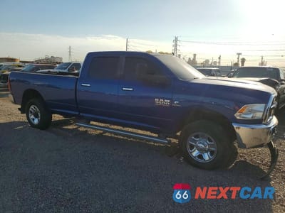 Czwarte zdjęcie samochodu z boku: 2014 RAM 3500 SLT VIN:3C63RRHL6EG153742 - miniatura