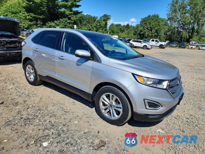 Czwarte zdjęcie samochodu z boku: 2016 FORD EDGE SEL VIN:2FMPK4J93GBB24877 - miniatura