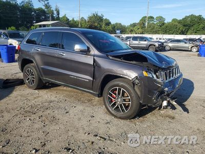 Czwarte zdjęcie samochodu z boku: 2014 JEEP GRAND CHEROKEE LIMITED VIN:1C4RJFBG4EC135702 - miniatura