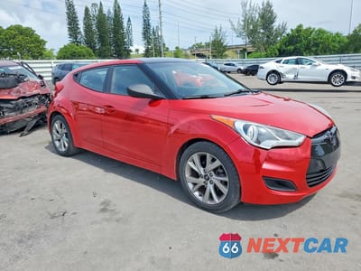 Czwarte zdjęcie samochodu z boku: 2016 HYUNDAI VELOSTER BASE VIN:KMHTC6AD9GU275728 - miniatura
