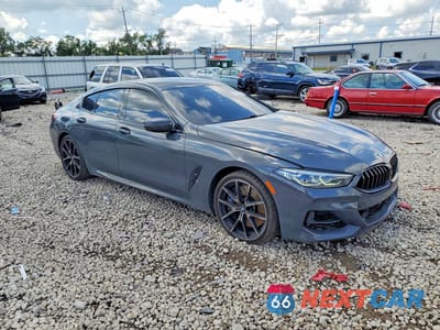 Czwarte zdjęcie samochodu z boku: 2022 BMW M850XI VIN:WBAGV8C09NCH81908 - miniatura