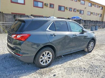 Trzecie zdjęcie samochodu z tyłu: 2018 CHEVROLET EQUINOX LT VIN:2GNAXJEV8J6262052 - miniatura