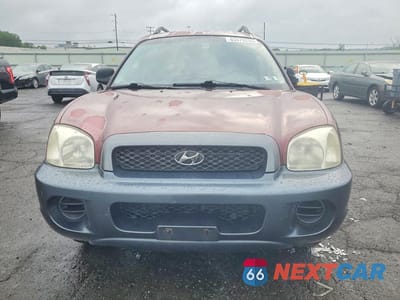 Piąte zdjęcie samochodu w środku: 2001 HYUNDAI SANTA FE GL VIN:KM8SB82B71U055230 - miniatura
