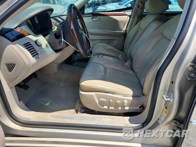 Zdjęcie 7 z 12 samochodu: 2007 CADILLAC DTS VIN:1G6KD57Y47U193359 - miniatura