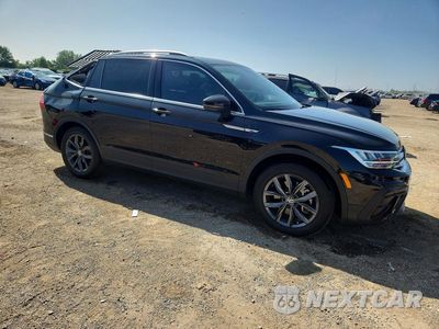 Czwarte zdjęcie samochodu z boku: 2023 VOLKSWAGEN TIGUAN SE VIN:3VVMB7AX7PM007911 - miniatura