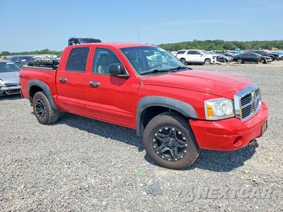 Czwarte zdjęcie samochodu z boku: 2005 DODGE DAKOTA QUAD LARAMIE VIN:1D7HW58N35S161975 - miniatura