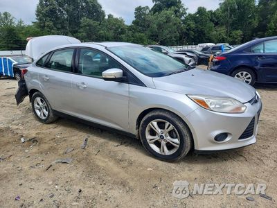 Czwarte zdjęcie samochodu z boku: 2013 FORD FOCUS SE VIN:1FADP3F21DL282909 - miniatura