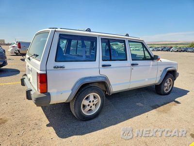 Trzecie zdjęcie samochodu z tyłu: 1990 JEEP CHEROKEE LAREDO VIN:1J4FJ58L4LL167588 - miniatura