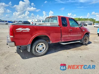 Trzecie zdjęcie samochodu z tyłu: 1999 FORD F150 VIN:1FTRX18L3XNA54946 - miniatura