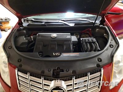 Zdjęcie 12 z 13 samochodu: 2013 CADILLAC SRX LUXURY COLLECTION VIN:3GYFNGE34DS521187 - miniatura