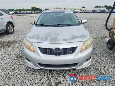 Piąte zdjęcie samochodu w środku: 2009 TOYOTA COROLLA S VIN:1NXBU40E39Z023659 - miniatura