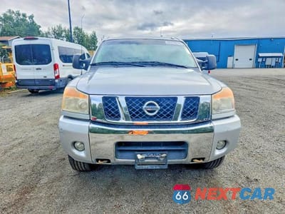 Piąte zdjęcie samochodu w środku: 2010 NISSAN TITAN SE VIN:1N6BA0EC5AN314477 - miniatura
