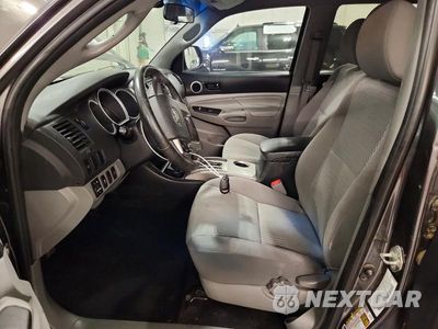 Zdjęcie 7 z 12 samochodu: 2014 TOYOTA TACOMA V6 VIN:3TMLU4EN6EM143181 - miniatura