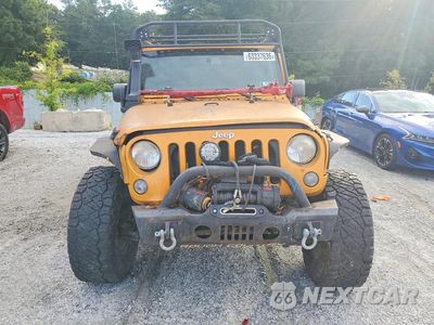 Piąte zdjęcie samochodu w środku: 2014 JEEP WRANGLER UNLIMITED SAHARA VIN:1C4BJWEG5EL201039 - miniatura