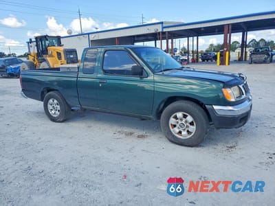 Czwarte zdjęcie samochodu z boku: 2000 NISSAN FRONTIER XE VIN:1N6DD26S5YC411279 - miniatura