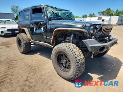 Czwarte zdjęcie samochodu z boku: 2012 JEEP WRANGLER RUBICON VIN:1C4BJWCG0CL227127 - miniatura