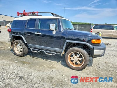 Czwarte zdjęcie samochodu z boku: 2007 TOYOTA FJ CRUISER BASE VIN:JTEBU11F270032122 - miniatura