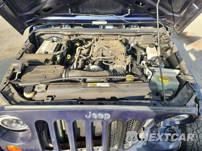 Zdjęcie 11 z 13 samochodu: 2013 JEEP WRANGLER UNLIMITED SPORT VIN:1C4BJWDG2DL618991 - miniatura