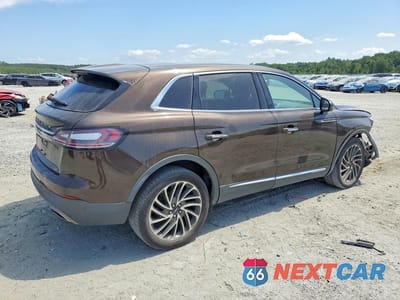 Trzecie zdjęcie samochodu z tyłu: 2020 LINCOLN NAUTILUS RESERVE VIN:2LMPJ6K95LBL12649 - miniatura