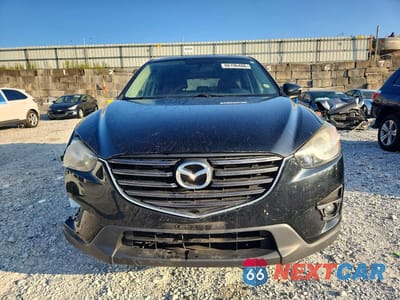 Piąte zdjęcie samochodu w środku: 2016 MAZDA CX-5 TOURING VIN:JM3KE2CY8G0653314 - miniatura