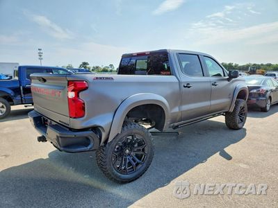 Trzecie zdjęcie samochodu z tyłu: 2026 CHEVROLET SILVERADO K1500 RST VIN:1GCUKEELXTZ343300 - miniatura