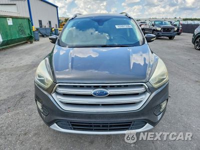 Piąte zdjęcie samochodu w środku: 2017 FORD ESCAPE TITANIUM VIN:1FMCU9J97HUB30750 - miniatura