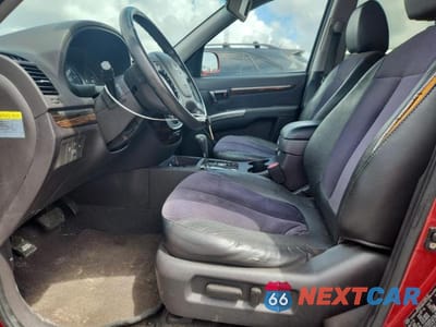 Zdjęcie 7 z 14 samochodu: 2010 HYUNDAI SANTA FE SE VIN:5NMSH4AG7AH392125 - miniatura