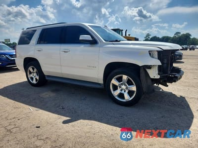 Czwarte zdjęcie samochodu z boku: 2015 CHEVROLET TAHOE C1500 LT VIN:1GNSCBKC4FR540031 - miniatura