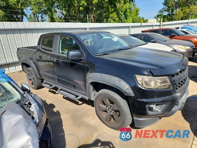 Czwarte zdjęcie samochodu z boku: 2018 CHEVROLET COLORADO LT VIN:1GCGSCEN1J1227000 - miniatura
