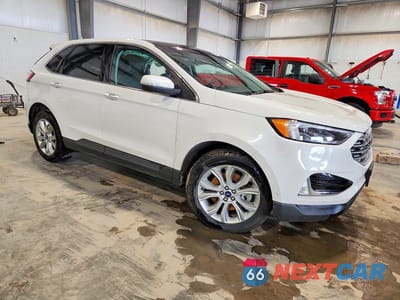 Czwarte zdjęcie samochodu z boku: 2020 FORD EDGE TITANIUM VIN:2FMPK4K93LBB24774 - miniatura