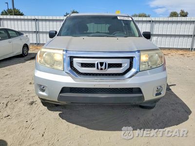 Piąte zdjęcie samochodu w środku: 2011 HONDA PILOT LX VIN:5FNYF3H21BB008606 - miniatura