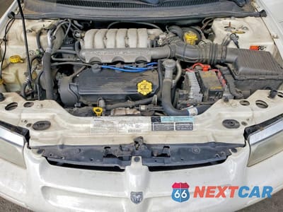 Zdjęcie 11 z 12 samochodu: 1999 DODGE STRATUS ES VIN:1B3EJ56H5XN608740 - miniatura