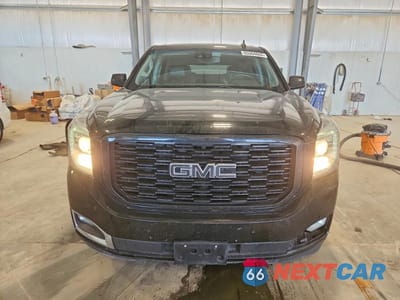 Piąte zdjęcie samochodu w środku: 2019 GMC YUKON SLT VIN:1GKS2BKC5KR165437 - miniatura