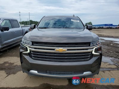 Piąte zdjęcie samochodu w środku: 2021 CHEVROLET SUBURBAN C1500 LT VIN:1GNSCCKD0MR237047 - miniatura