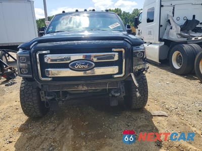 Czwarte zdjęcie samochodu z boku: 2011 FORD F350 SUPER DUTY VIN:1FT8W3BT3BEB69526 - miniatura