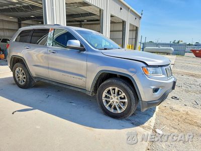 Czwarte zdjęcie samochodu z boku: 2016 JEEP GRAND CHEROKEE LAREDO VIN:1C4RJFAG1GC345632 - miniatura